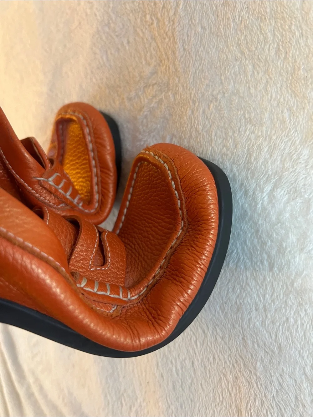 Rockport women’s orange pebbled leather square toe penny loafers